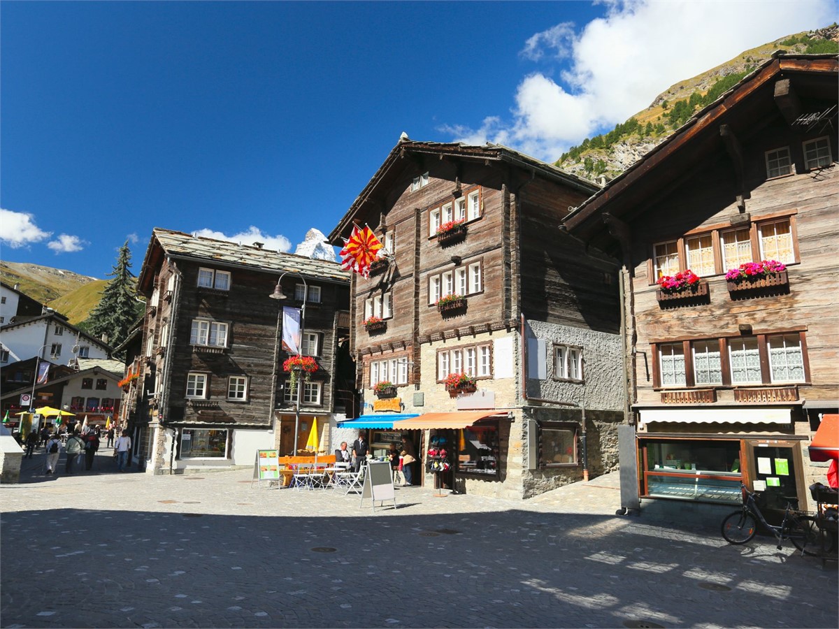 Traditional and typical Swiss houses made of old wood in Zermatt
